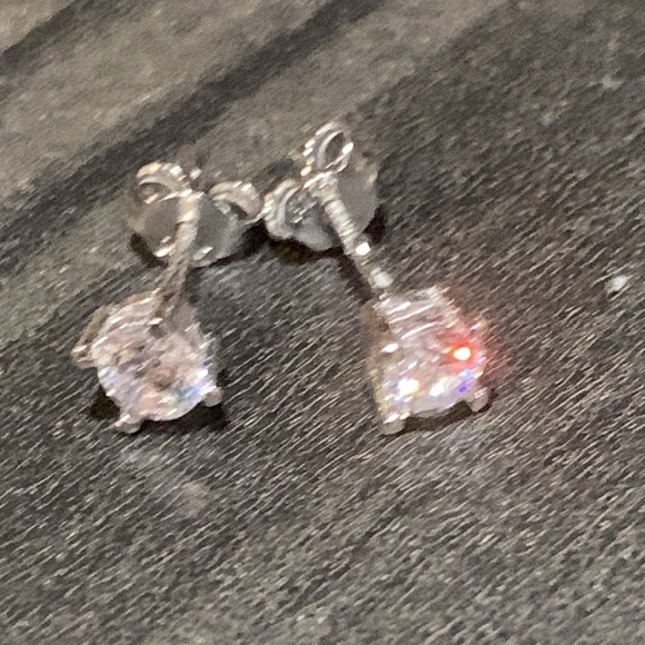 Elegant Silver diamonds Stud Earrings. Must have for collectors or gift!